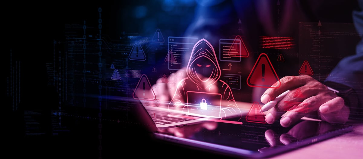 Cybersecurity threat concept with hacker icon, red alerts, and data lock over laptop, representing malware, phishing, and breach risks.
