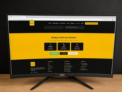 Monitor displaying a website with yellow banner, requirements section with green and red icons, and device sales options